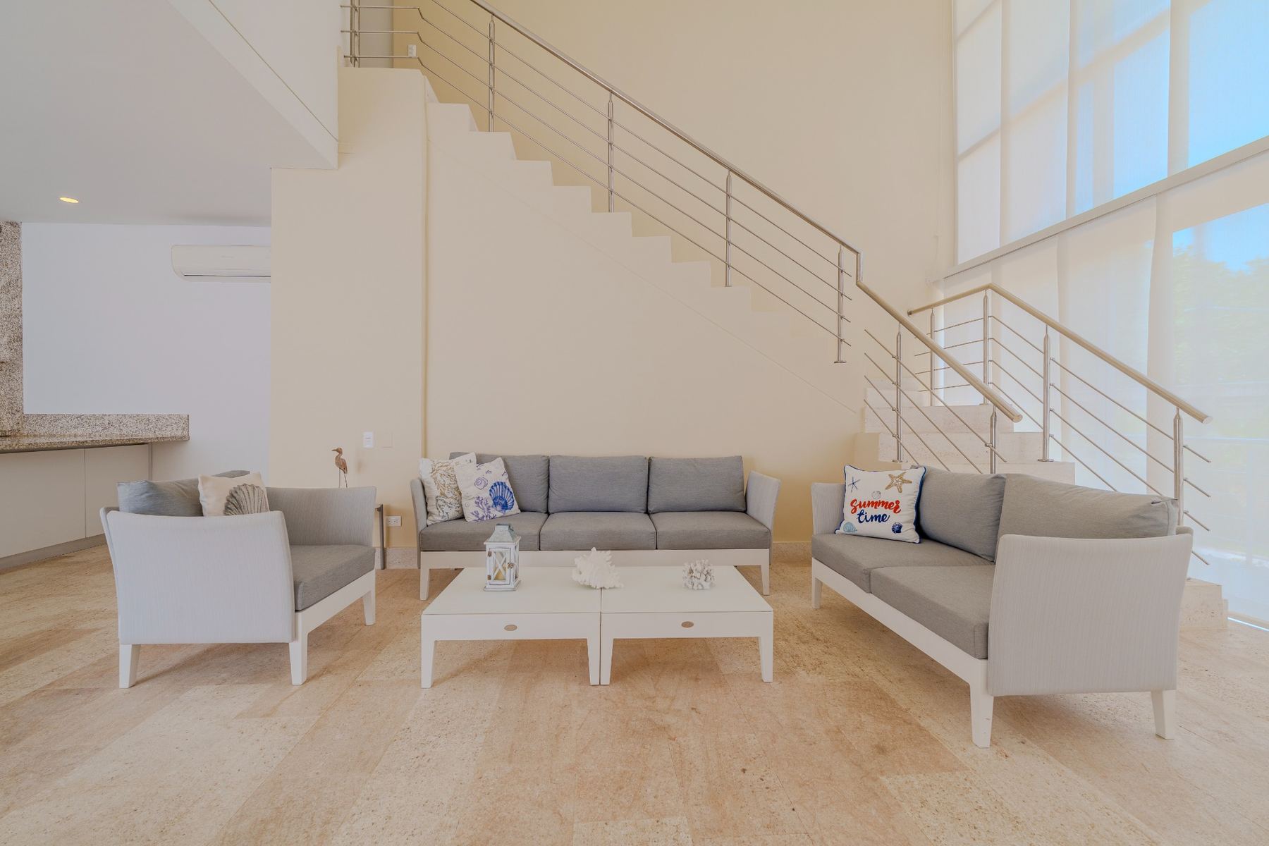 Casa Areia main living room with stairs in Cartagena